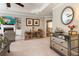 Sitting area with fireplace, built-ins, and natural light from windows at 2190 Rugby Ave, Atlanta, GA 30337