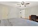 Spacious bedroom with a ceiling fan, and large closet at 3653 Memorial Nw Pkwy, Kennesaw, GA 30152