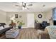 Second living area featuring hard surface flooring, desk, and door to the exterior at 3653 Memorial Nw Pkwy, Kennesaw, GA 30152