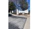 Community entrance sign for Lenox Heights, surrounded by manicured landscaping and stone pavers at 4106 Pine Heights Ne Dr, Atlanta, GA 30324