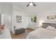 Comfortable bedroom featuring hardwood floors, a large window, and stylish decor elements at 3306 Briarcliff Ne Rd, Atlanta, GA 30345