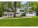 Charming home with well-manicured lawn, front yard, garage and driveway at 3306 Briarcliff Ne Rd, Atlanta, GA 30345