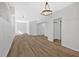 Large basement with wood floors, modern lighting, and room for entertaining at 4990 Sawgrass Nw Pl, Acworth, GA 30102