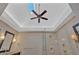 Bright bathroom featuring walk-in glass shower with transom window at 4990 Sawgrass Nw Pl, Acworth, GA 30102