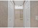 Hallway view of the bathroom with walk-in shower at 4990 Sawgrass Nw Pl, Acworth, GA 30102