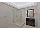 Stylish bathroom featuring walk-in glass shower and a granite-topped vanity at 4990 Sawgrass Nw Pl, Acworth, GA 30102