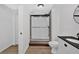 Bathroom featuring a glass enclosed shower and a modern vanity with black hardware at 4990 Sawgrass Nw Pl, Acworth, GA 30102