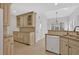 Kitchen showcasing countertops, white cabinets, stainless steel appliances, and tile flooring at 4990 Sawgrass Nw Pl, Acworth, GA 30102