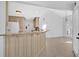 Kitchen view featuring granite countertops, a breakfast bar and tile flooring at 4990 Sawgrass Nw Pl, Acworth, GA 30102