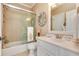 Bright bathroom with a shower-tub combination and single-sink vanity at 8025 Georgetown Cir, Suwanee, GA 30024