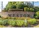 Stone Weston community sign surrounded by landscaping at 8025 Georgetown Cir, Suwanee, GA 30024