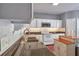 Functional kitchen with stainless appliances, white cabinets, and granite countertops at 5362 Hickory Nw Knl, Norcross, GA 30071