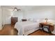 Cozy bedroom featuring hardwood floors and vintage accents at 6475 Holland Dr, Cumming, GA 30041