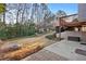 Backyard with a fire pit, patio, and grassy areas at 86 Templeton Ln, Villa Rica, GA 30180