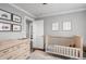 Charming Bedroom with a crib, changing table, and neutral decor at 2413 Drew Valley Rd, Brookhaven, GA 30319