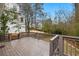 Spacious outdoor deck overlooking a grassy back yard with mature trees at 2413 Drew Valley Rd, Brookhaven, GA 30319