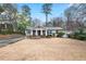 Classic bungalow with a well manicured lawn and a quaint front porch at 2413 Drew Valley Rd, Brookhaven, GA 30319