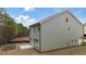 New home featuring a large backyard with a concrete patio at 1084 Georgian Point Dr, Lawrenceville, GA 30045
