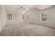 Expansive bedroom with high ceilings and multiple windows at 1084 Georgian Point Dr, Lawrenceville, GA 30045
