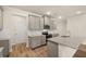 Stylish kitchen with granite countertops, stainless steel appliances, and a subway tile backsplash at 1084 Georgian Point Dr, Lawrenceville, GA 30045
