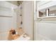 Clean bathroom with tiled shower and grab bars for safety at 2796 County Line Nw Rd, Acworth, GA 30101