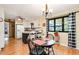 Bright dining area adjacent to the kitchen with a breakfast nook and natural light at 2796 County Line Nw Rd, Acworth, GA 30101