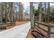 Driveway entrance with tasteful landscaping and decorative planters at 2796 Private Drive at 2796 County Line Nw Rd, Acworth, GA 30101