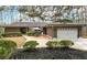 Charming home with manicured landscaping, inviting patio and attached two-car garage at 2796 County Line Nw Rd, Acworth, GA 30101