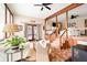 Open living area with wood flooring, a cozy seating arrangement, and access to the outdoors at 2796 County Line Nw Rd, Acworth, GA 30101