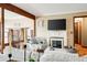 Inviting living room with a fireplace, TV, and comfortable seating arrangement at 2796 County Line Nw Rd, Acworth, GA 30101