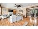 Living room featuring hardwood floors, a fireplace and adjacent dining area at 2796 County Line Nw Rd, Acworth, GA 30101