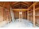 Interior view of outbuilding with exposed wood, storage shelves and ladders at 2796 County Line Nw Rd, Acworth, GA 30101