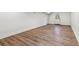 Finished basement with laminate flooring and a white-painted door at 2818 Thornbriar Road, Atlanta, GA 30340