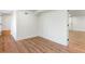 Finished basement space with laminate flooring and painted white walls at 2818 Thornbriar Rd, Atlanta, GA 30340