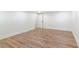 Finished basement area featuring laminate flooring and a single recessed light at 2818 Thornbriar Rd, Atlanta, GA 30340