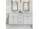 Bright bathroom featuring double vanity, white shaker cabinets, and chrome fixtures at 2818 Thornbriar Rd, Atlanta, GA 30340