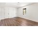 Bedroom featuring laminate flooring and a window for natural lighting at 2818 Thornbriar Road, Atlanta, GA 30340