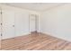 Bright bedroom features a closet and wood-look laminate flooring at 2818 Thornbriar Rd, Atlanta, GA 30340