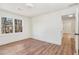 Bedroom with natural light from a window and wood-look laminate flooring at 2818 Thornbriar Rd, Atlanta, GA 30340