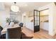 Dining room with eat in kitchen featuring a dark metal and glass partition at 2818 Thornbriar Rd, Atlanta, GA 30340