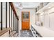 Foyer featuring natural light, slate tile, custom built-ins and storage at 2818 Thornbriar Road, Atlanta, GA 30340