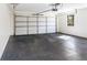 Spacious garage with an automatic door opener and a window bringing in natural light at 2818 Thornbriar Rd, Atlanta, GA 30340