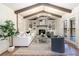 Comfortable living room with vaulted ceiling, built-in shelving, and access to outdoor space at 2818 Thornbriar Rd, Atlanta, GA 30340