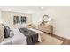 Main bedroom features wood floors, recessed lighting, and a decorative mirror at 2818 Thornbriar Rd, Atlanta, GA 30340
