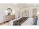 Main bedroom featuring light wood dresser, recessed lighting, and attached bathroom at 2818 Thornbriar Rd, Atlanta, GA 30340