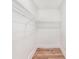 A bright walk-in closet with wire shelving and wood floors at 2818 Thornbriar Rd, Atlanta, GA 30340