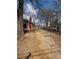 Long driveway offers ample parking space for multiple vehicles with potential for future development or landscaping at 633 Langston Sw Dr, Atlanta, GA 30315