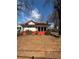 Charming single-Gathering home with a cozy front porch and landscaped yard, perfect for relaxing outdoors at 633 Langston Sw Dr, Atlanta, GA 30315