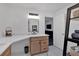 Bright bathroom featuring a large vanity and access to bedroom at 8980 Country Club Dr, Douglasville, GA 30134
