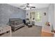 Charming Bedroom with blue wallpaper, crib, glider chair, and a serene ambiance at 8980 Country Club Dr, Douglasville, GA 30134